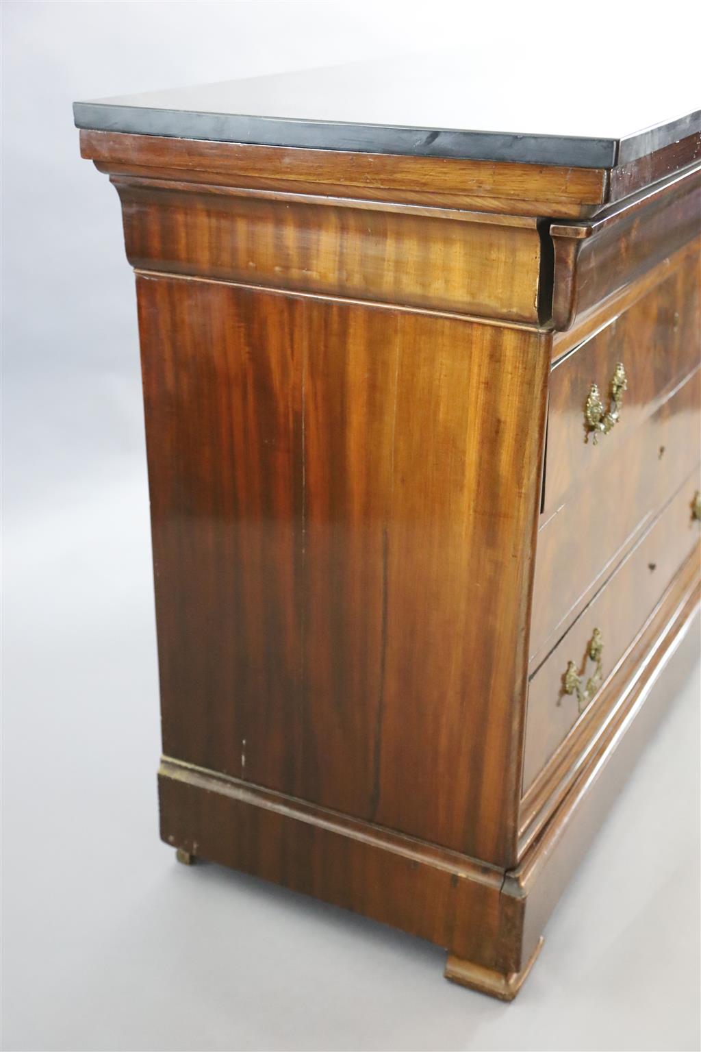 A 19th century French flame mahogany commode, W.4ft 2in. D.1ft 10in. H.3ft 2in.